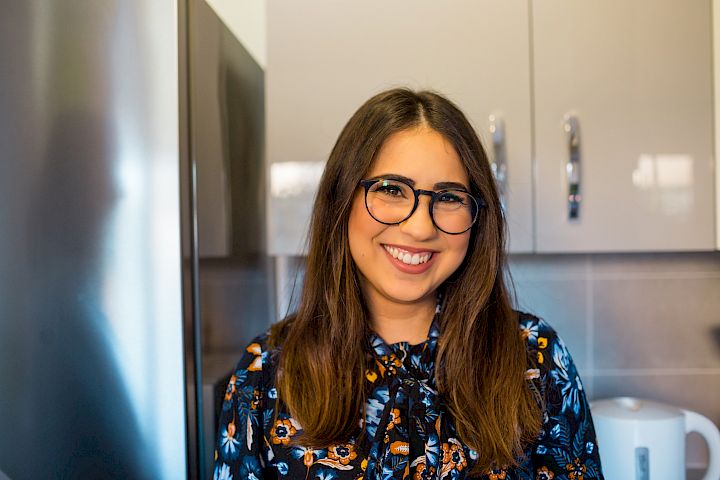 Woman smiling in a Fergus kitchen